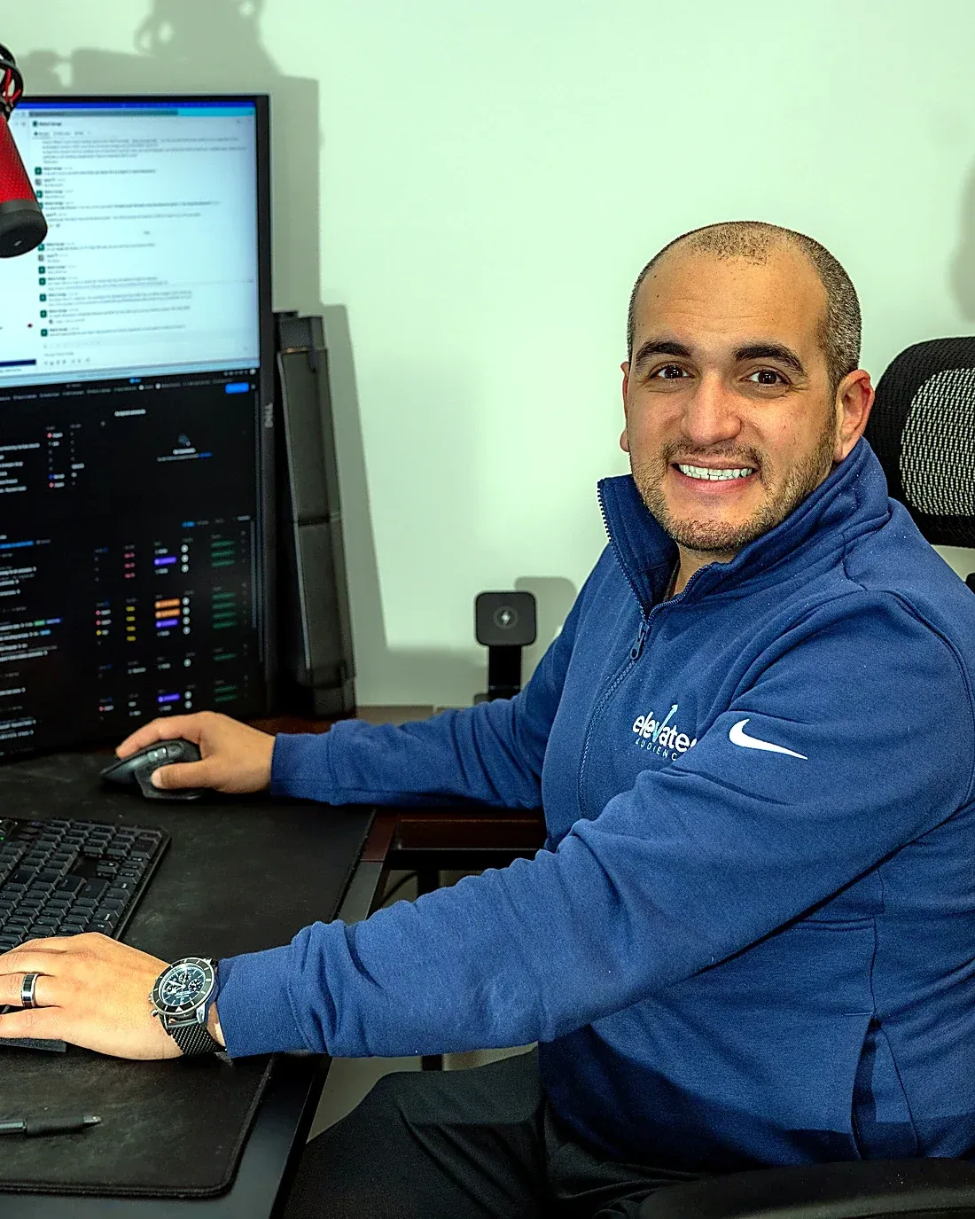 Jared Tangir, founder of Elevated Audience, at his desk in the Doylestown office