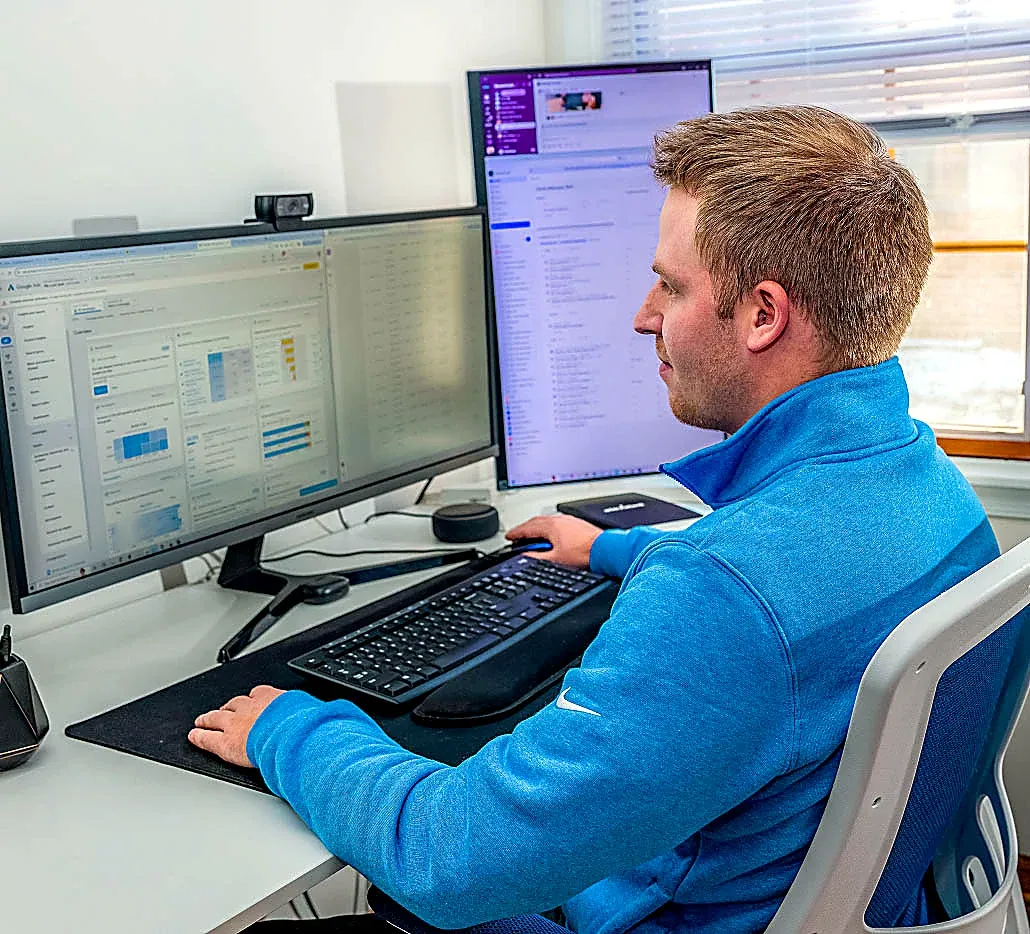 An Elevated Audience strategist reviewing a client's Google Ads account on screen
